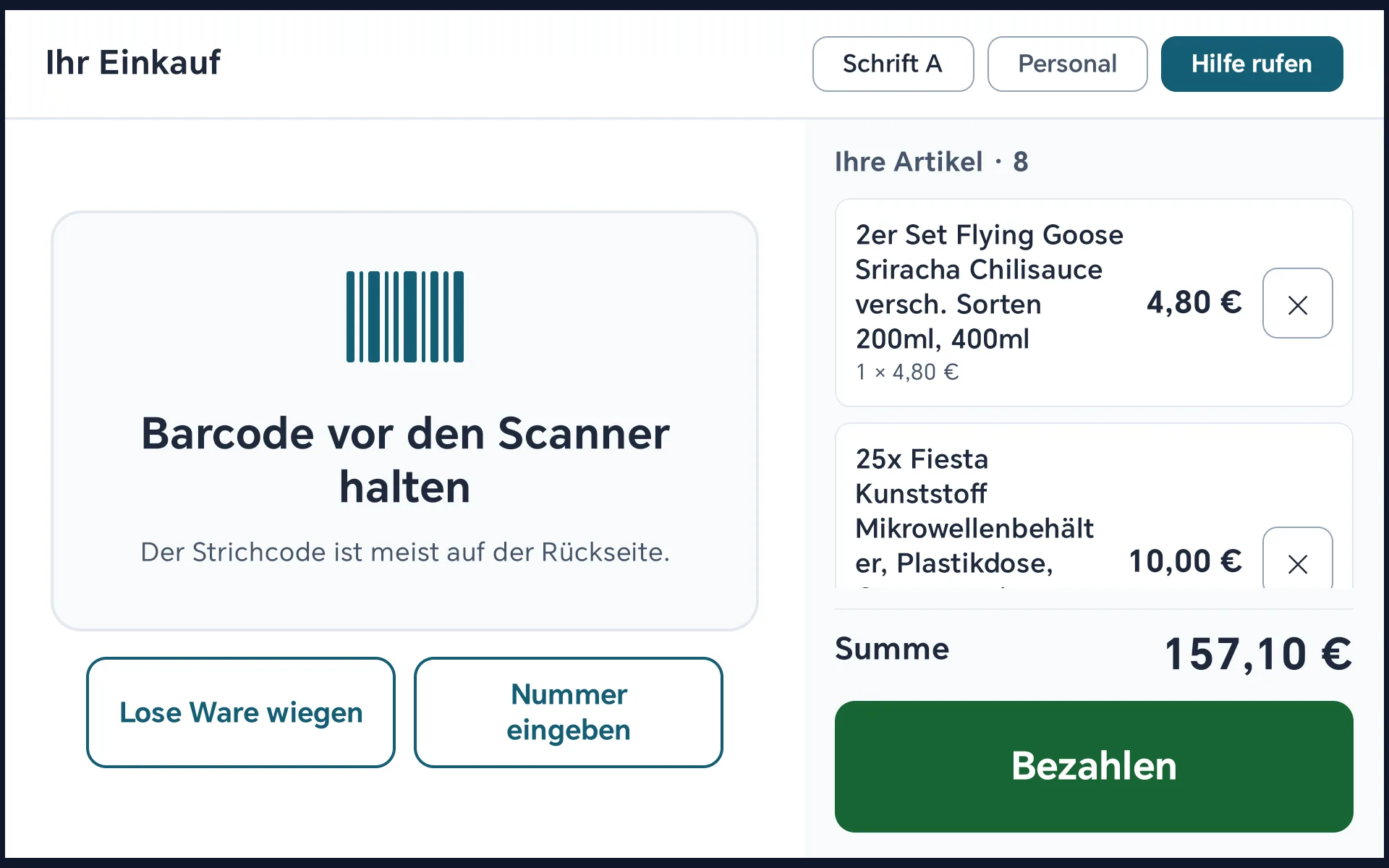 Warenkorb mit acht Artikeln, Summe 157,10 Euro, großer Bezahlen-Knopf