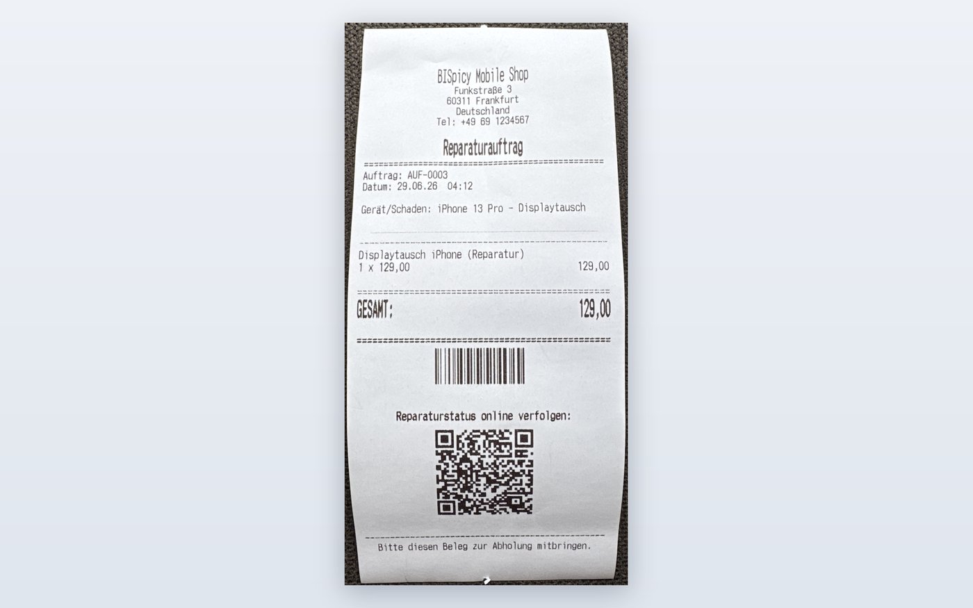 Abholbeleg mit Barcode und QR-Code zur Statusabfrage